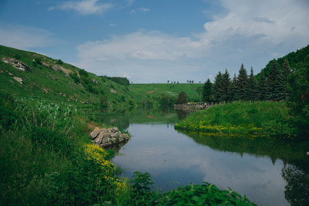 blue lake on a background of green hills