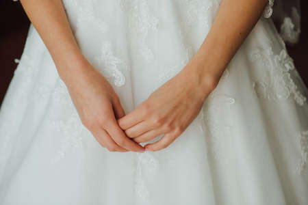 Bride's hands closeup at wedding.The bride waits for groomの写真素材