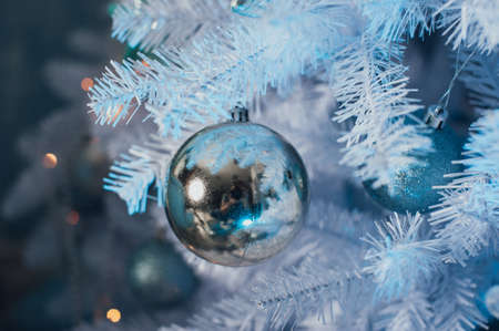 Blue Christmas ball on the Christmas treeの写真素材