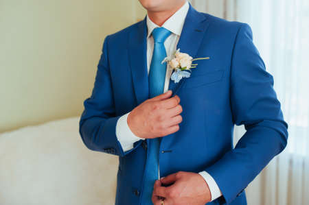 the groom in a blue suit with tieの写真素材