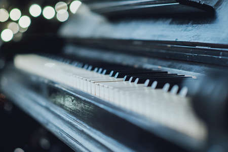 Old vintage piano keyboard. The beautiful background blurの写真素材