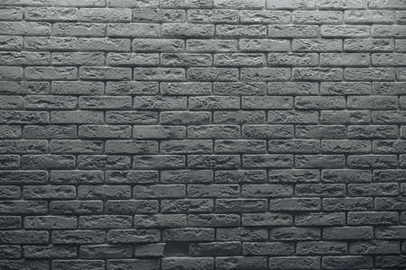 Wall from a white brick. The backgroundの写真素材