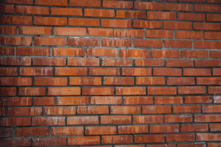 The wall of red brick. Masonry. The background