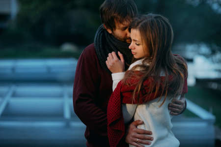 Young stylish couple on a background of an evening natureの写真素材