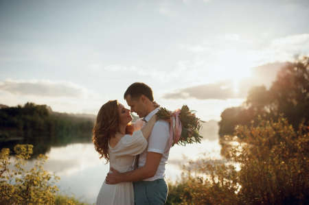 The bride and groom in nature. Rustic Weddingの写真素材