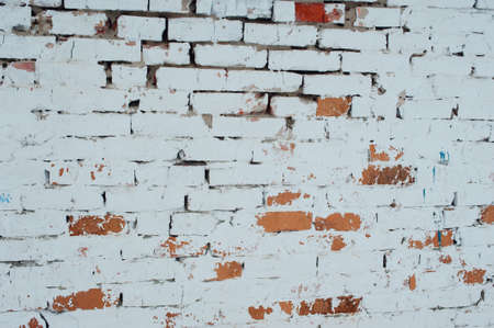 Old brick wall with white and red bricksの写真素材
