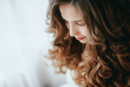 Luxury stylish bride sitting on the bedの写真素材