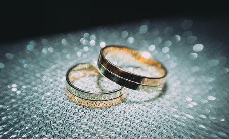 beautiful gold wedding rings on the brides preparationsの写真素材