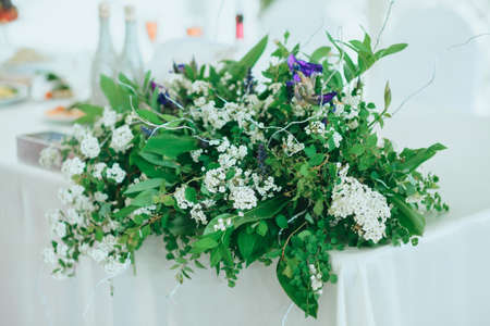 Beautiful wedding ceremony outdoors. Arch made of natural flowers. Decorの写真素材