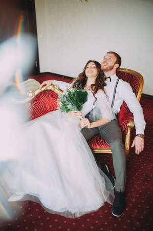 The bride and groom in hotel roomの写真素材