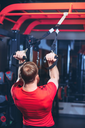 an athlete is engaged in a sports simulator in the gym