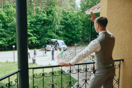 Handsome groom at wedding tuxedo waiting for bride. Rich groom at wedding dayの写真素材