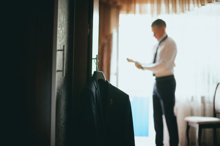 wedding groom preparations at the hotel. morningの写真素材