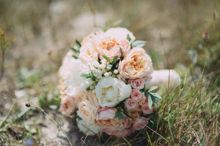 stylish beautiful bridal bouquet from different flowersの写真素材