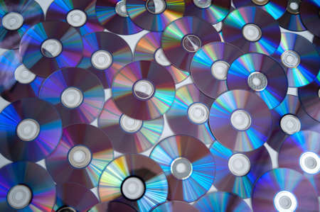 Bunch of cd discs on a white backgroundの写真素材