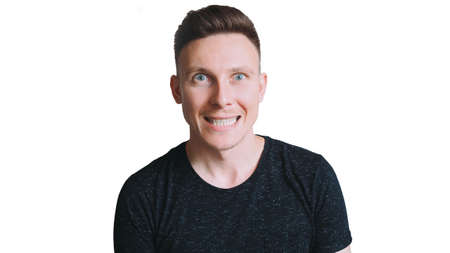 portrait of a stylish man on a white background. isolate having fun fooling around laughingの写真素材