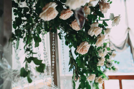 Wedding archway with flowers arranged in park for a wedding ceremonyの写真素材