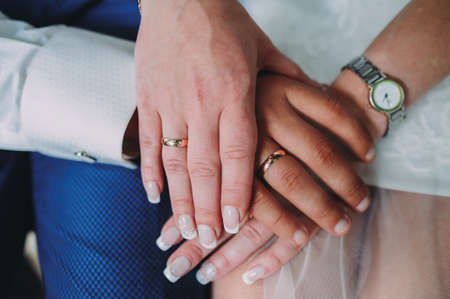 close-up of bride and groom with a bouquetの写真素材