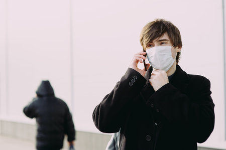 Chinese man in a medical mask. coronavirus. Surgical Face Masks, Asian Men Wearing Anti-Germ and Dust Masksの写真素材