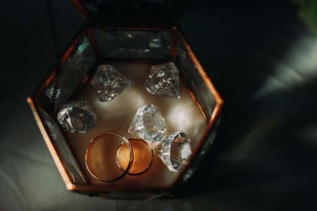 beautiful gold wedding rings in a boxの写真素材