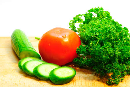 Tomatoes and cucumbers の写真素材