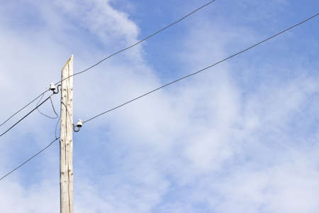Electricity pylon and blue skyの写真素材