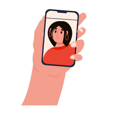 A hand holds a smartphone with a cute girl on the screen. The concept of a video call. Trend vector illustration isolated on a white background.のイラスト素材