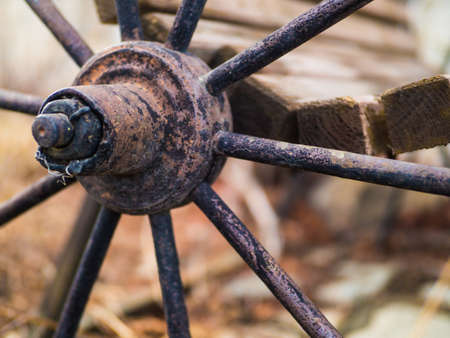 Closeup of an old, antique wagon wheelの写真素材
