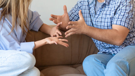 Hands of a quarreling couple close-up.の写真素材