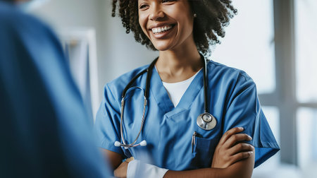 Hospital staff having fun chatting with each other during a break. Laughter becomes the best medicine as hospital staff take a breather, lifting spirits and fostering a positive work environment.の素材