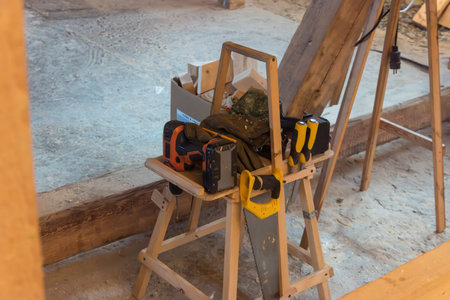 the carpenters tool is tidied up on a special wooden shelfの写真素材
