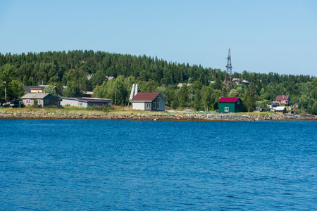view from the sea on the coast of a fishing village in the north.の写真素材