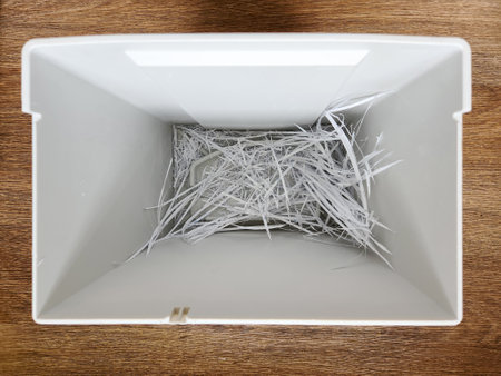 shredded documents to protect confidential information, safety concept, background, top view,...