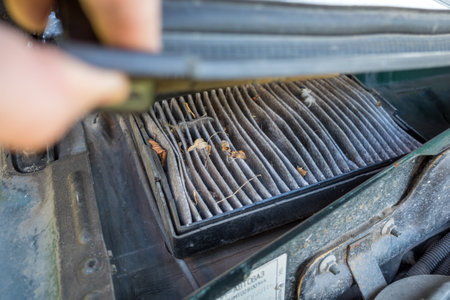 Replacing the air cabin filter the car. Replacing Air filter. car maintenance. close-upの写真素材