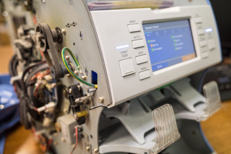 Disassembled calculating and monetary machine, maintenance and repair of banking equipment. close-up