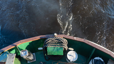 Top view of a part of the stern and a trace on the water from the steamer.の写真素材