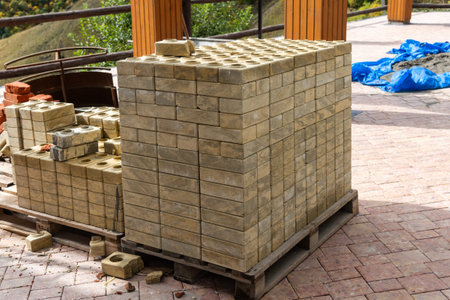 Stack of new bricks for building on construction siteの写真素材