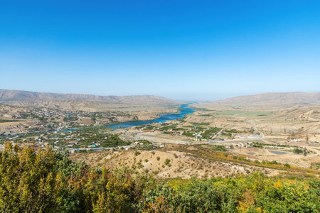 panoramic view of the Sulak River in Dagestan against the background of mountains and blue sky....