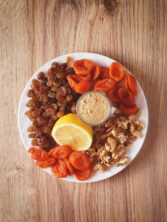 raisins dried apricots in a glass jarの写真素材