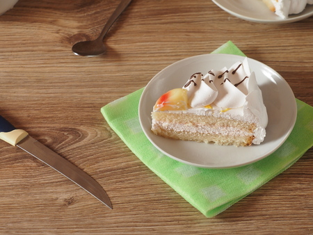 A piece of cake on a saucer cut offの写真素材