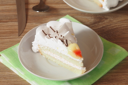 A piece of cake on a saucer cut offの写真素材