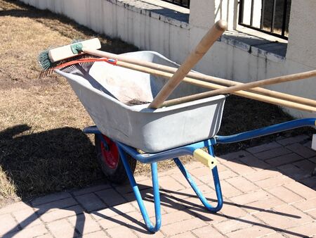 cart with tools for spring cleaningの写真素材