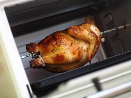 chicken baked in a mini ovenの写真素材