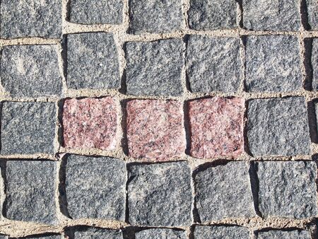 the texture is a square granite stone pavementの写真素材