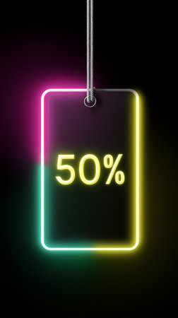 Bright neon sale tag displaying a 50 percent discount promotionの素材