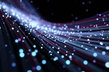 Colorful light trails create a mesmerizing effect in a dark spaceの素材