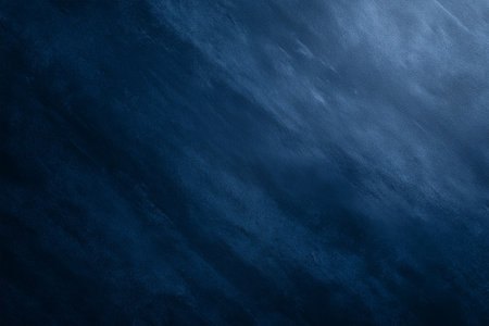 Deep blue textured surface with subtle patterns and movementの素材