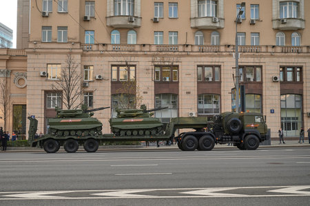 Russian Federation, Moscow, 2021.04.29. Victory Day parade rehearsal. Combat vehicles pass along the street of the city.のeditorial素材