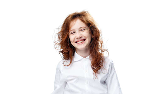 Joyful child laughing on isolated background, girl laughing.の写真素材
