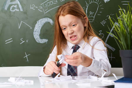 Girl school first class joy, girl schooling at school.の写真素材